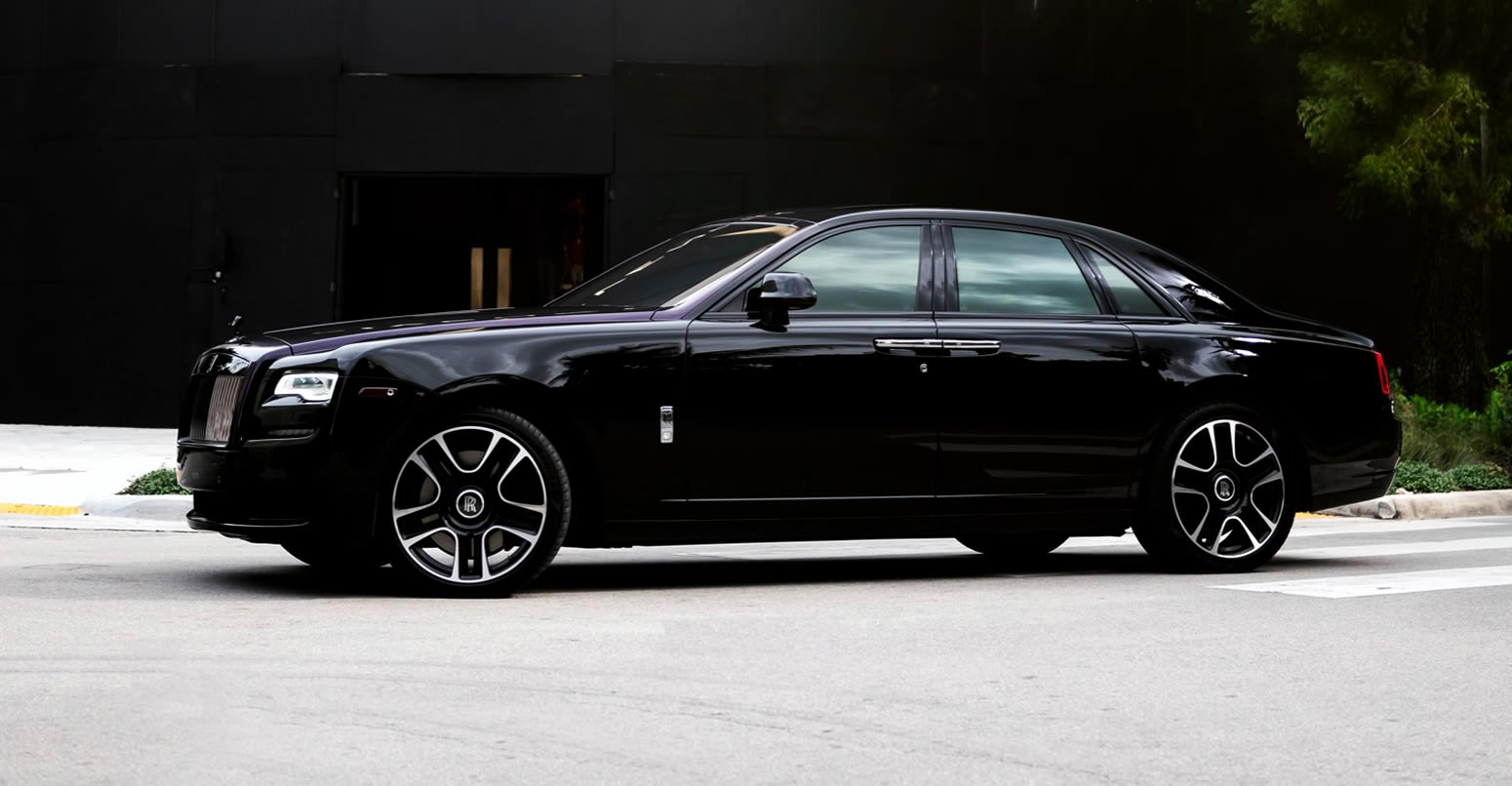Rolls Royce Ghost rental rear old model side view